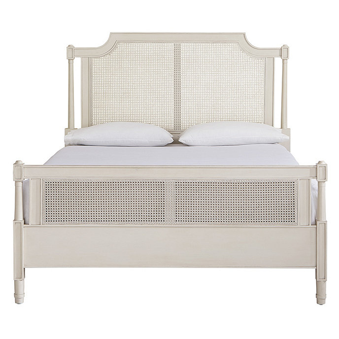 Image of a white wooden bed